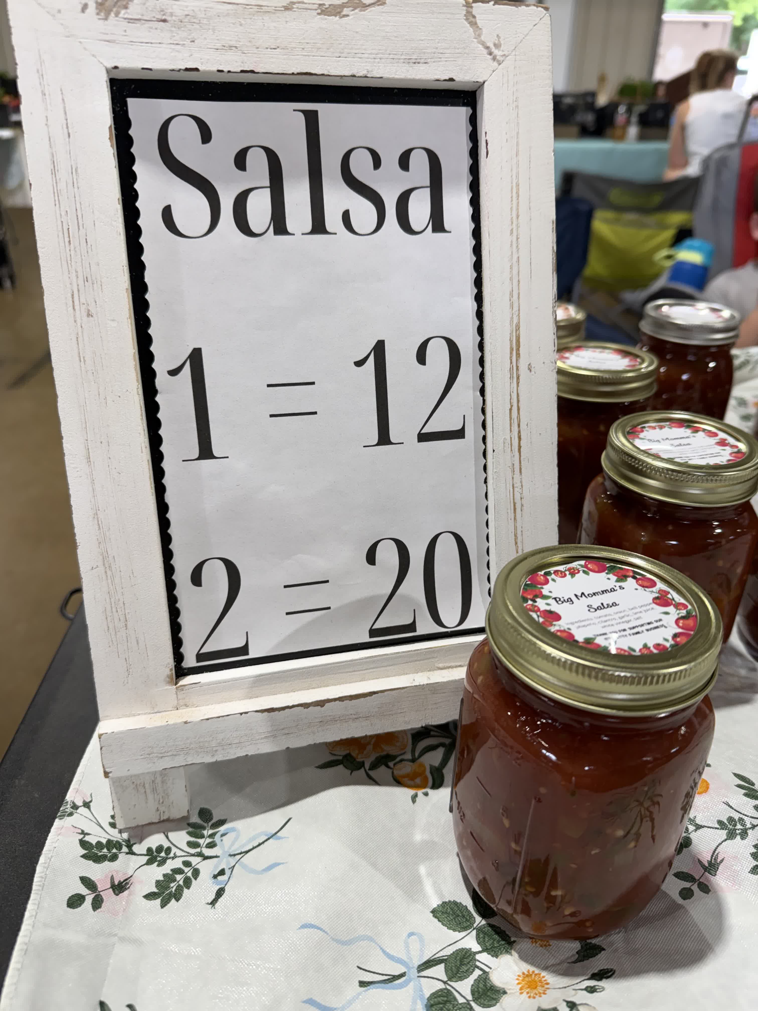 Big Momma Salsa jars displayed beside a pricing sign